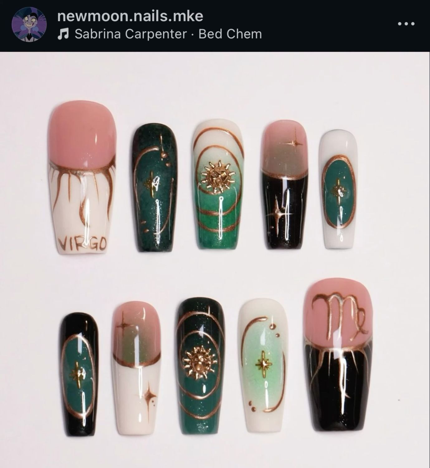 Many square-tipped press-on nails with various designs including words, sun, and zodiac symbols.