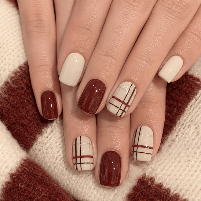 Brown nails with fine plaid line accents and a glossy finish.